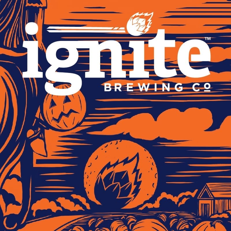 A zoomed in image of Ignite Brewing Co's Cherry Blonde label. The label features a sunset behind a lake.